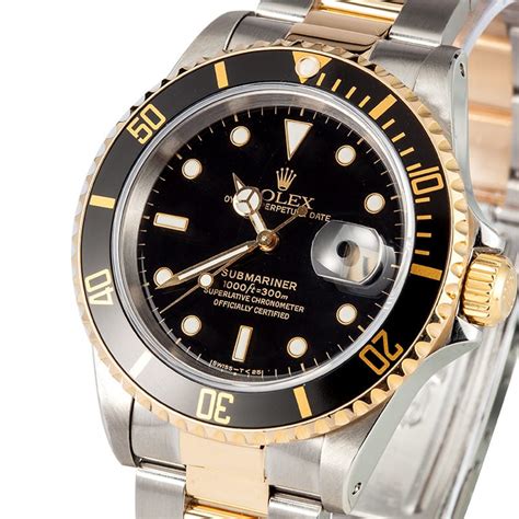 1988 gold rolex submariner black face stainless steel band|rolex 8385 18k white gold.